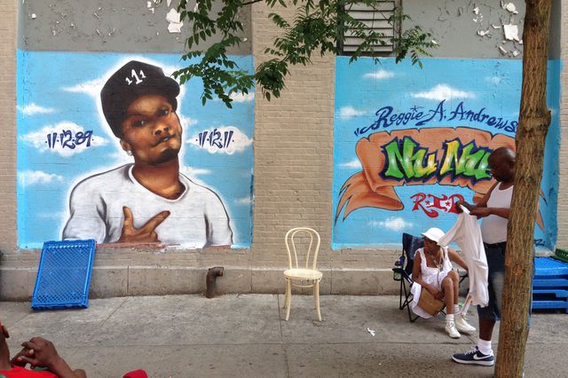 This work memorializes Reggie Andrews, aka Nu Nu. He was shot and killed outside his home on November 12, 2011—<a href="http://www.dnainfo.com/new-york/20111113/harlem/reggie-andrews-shot-death-outside-home-on-birthday">his birthday</a>. The artist is Topaz. Located at 111th St and 5th Ave.